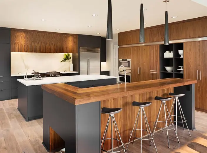 Kitchen cabinetry · warm wood and dark surfaces