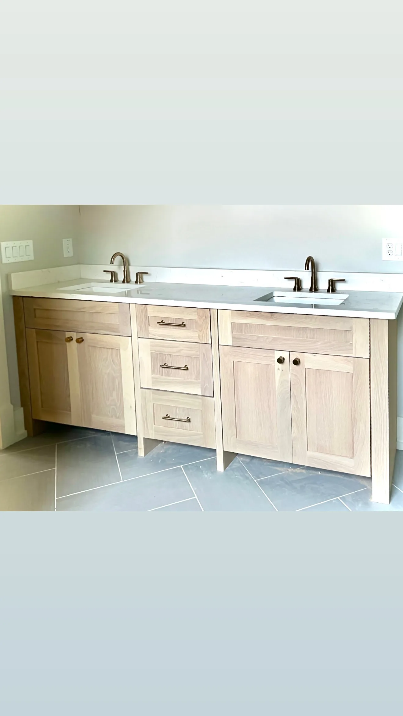 Completed bathroom vanity project by HQ Construction & Remodeling