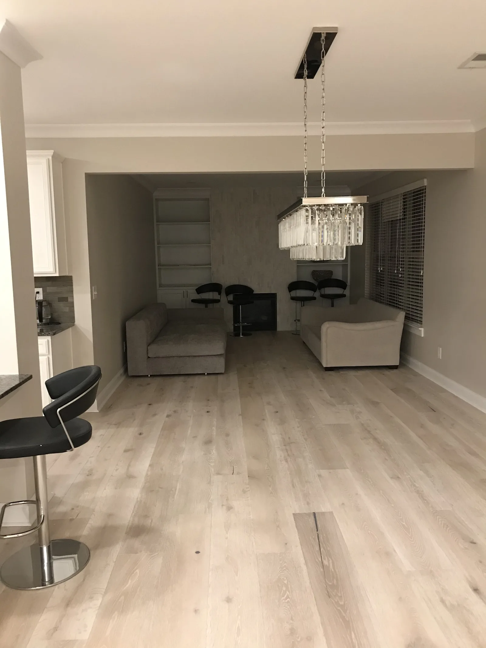 Interior remodeling project by HQ Construction & Remodeling with updated flooring and open living area